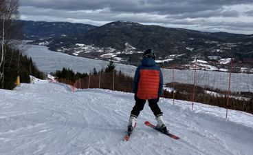 a person skiing on the snow
